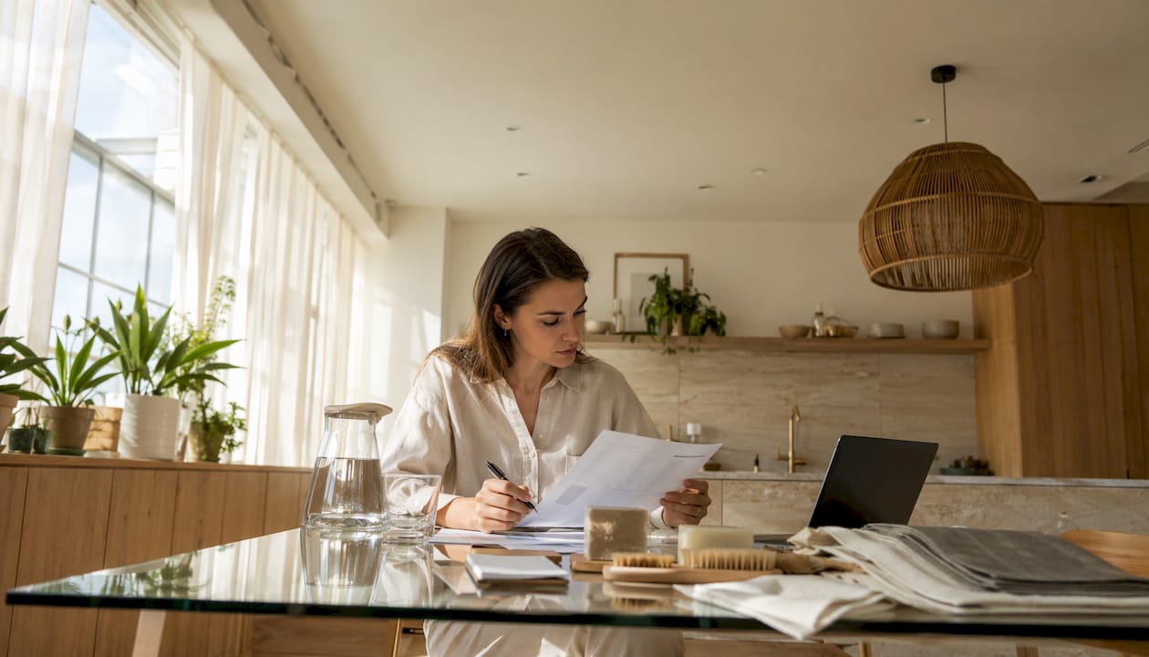 Consultant examining sustainable product reports